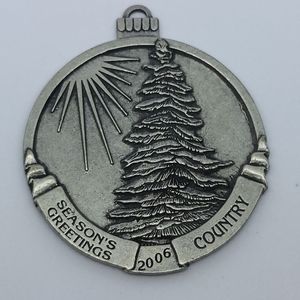 2006 Metal Christmas Ornament Country Woman Magazine Tree and Sun Rays